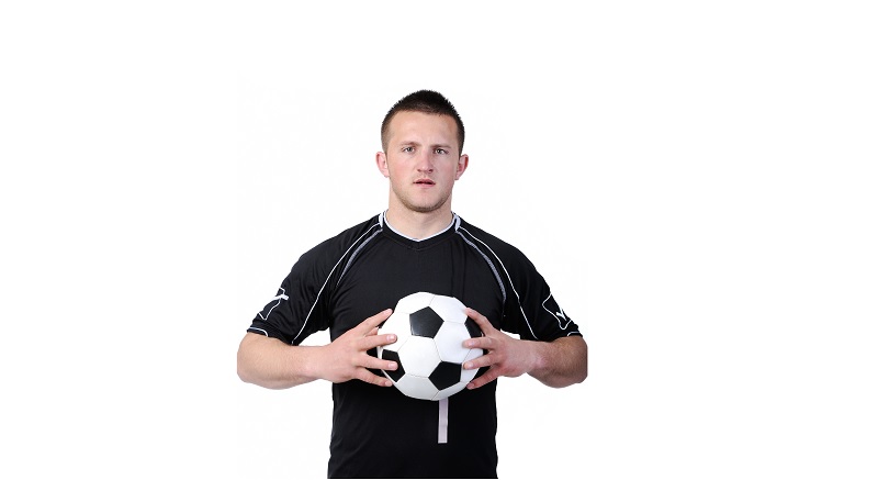 football player holding the ball